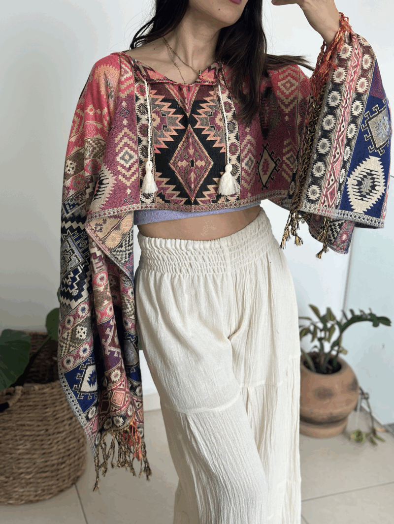 Capita / Poncho Rosa